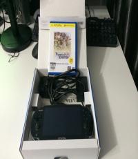 Sony PS Vita 1000 Black Wifi with 4GB Memory Card & Game