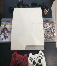 PS3 Slim White console with 2 controllers and 2 games