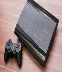 Barely Used Playstation 3 Super Slim w Original Games