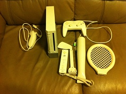 Nintendo Wii Console (with 2 controllers and nunchucks)
