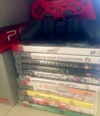 PS3, 2 Guitar Heroes, 2 Mics, & 13 Games