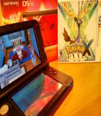 3DS XL Colour black with Pokemon X (Code redeemed )