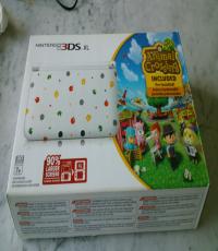 Nintendo 3DS XL and 6 Games  (Animal crossing edition)