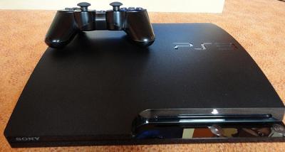160GB Playstation 3 Slim console, 2 controllers and Games