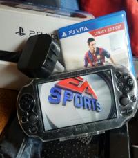 PS Vita console with 8gb memory card and fifa 15