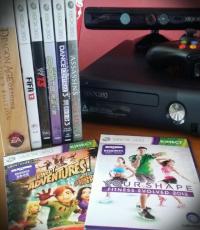 Xbox 360 Console with Kinect. 1 original controller and 8 games.