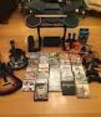Playstation 3 320GB Black Console, 8 games and guitar heroes set
