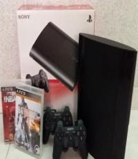 PS3 console, 250GB Superslim Black,  2 Controllers and  2 Games