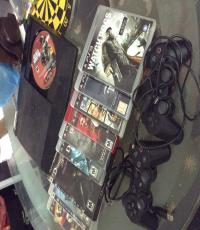 500GB PlayStation 3 Console, 2 Controllers and 10 Games