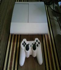 White super slim 500gb PS3 and 9 games
