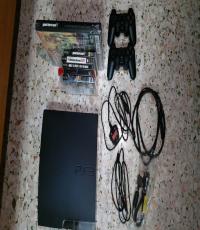 PS3 Slim 160GB console with 2 controllers and some PS3 games