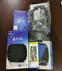 PS Vita with Accessories & a Game