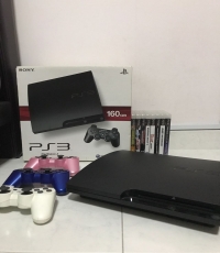 PS3 Slim bundle with 3 Controllers & 8 Games (ps3)