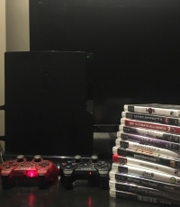 PS3 Slim console 320Gb with 12 games