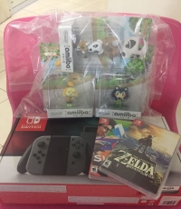 Console and 2 game ( Zelda and 12 switch)