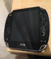 PS Vita Console Wifi only Black with 4 Games 8GB memory