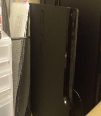160GB Playstation 3 Slim console, 2 controllers and 5 Games