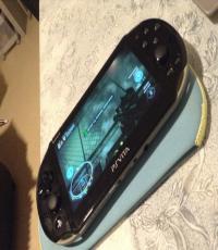 PS Vita 2000 Slim (Khaki 32gb Memory card & pouch)